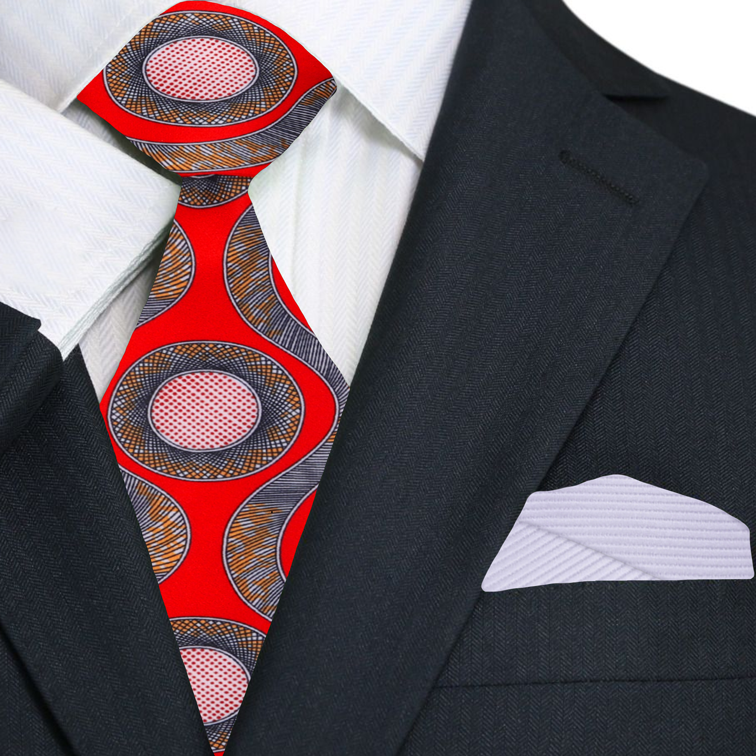 Close-up of a suit with a red and blue patterned tie and white pocket square.