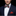 man wearing Christmas bow tie and accenting square