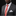 Man wearing a gray suit with a colorful red tie and white shirt on a black background