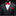 Man wearing a black suit with a red bow tie and pocket square on a dark background
