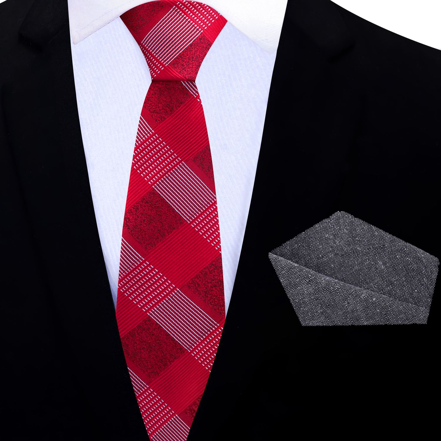Red plaid tie and gray pocket square on a black suit jacket.