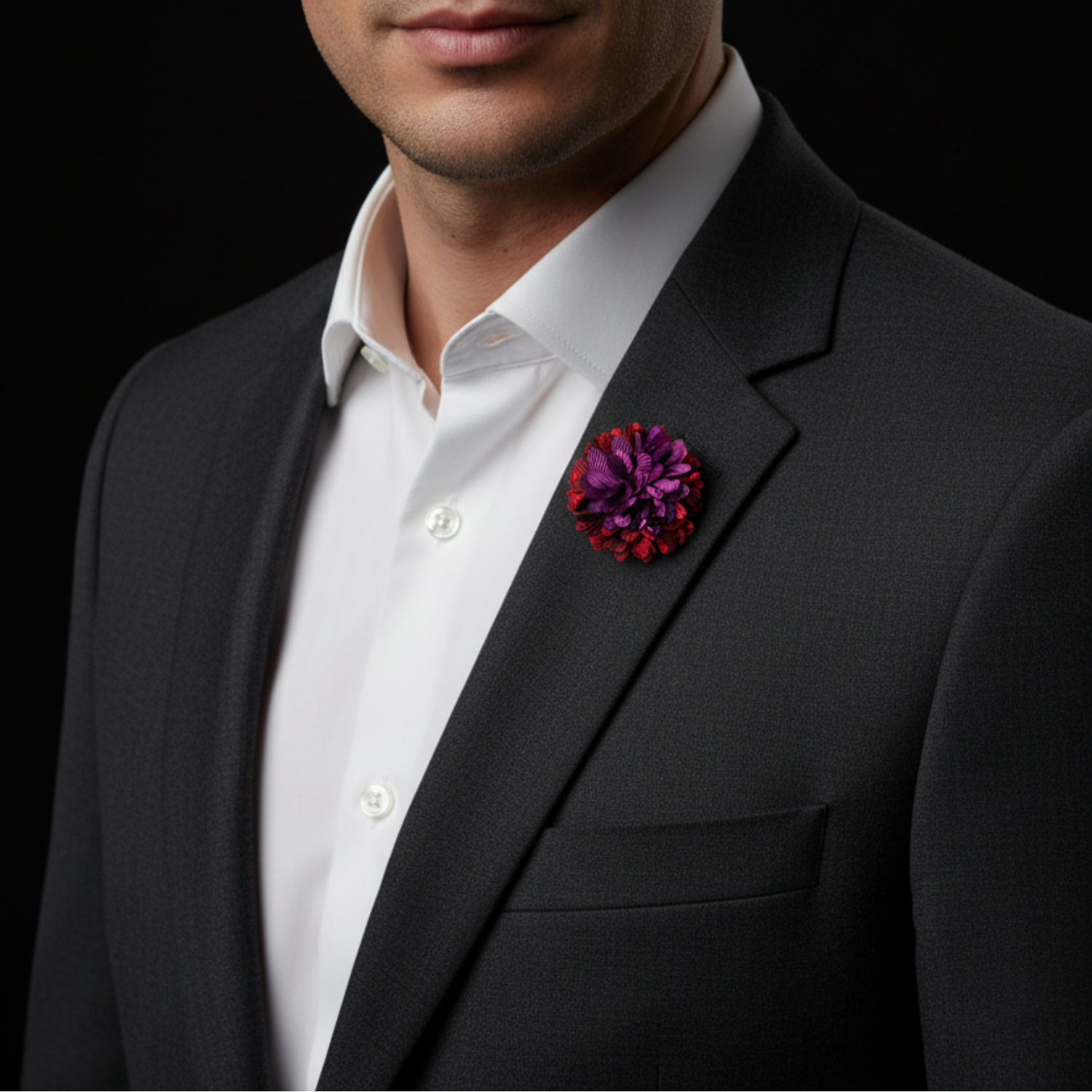 Multicolored flower-shaped brooch on a white background