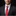 Man wearing a black suit with a red patterned tie and a matching pocket square against a dark background