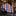 Roll of plaid tie on a reflective surface with a glass of whiskey in the background