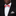 Man wearing a black suit with a red and white bow tie and patterned pocket square.