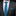 Man wearing a gray suit with a blue patterned tie and pocket square.