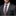 Man wearing a gray suit with a patterned tie and blue pocket square on a black background