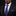Man wearing a black suit with a purple tie and pocket square on a black background
