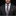 Man wearing a dark suit with a colorful tie and pocket square against a black background