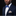 Man wearing a navy suit with a blue bow tie and patterned pocket square on a black background