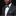 Man wearing a dark suit with a patterned bow tie and pocket square against a black background