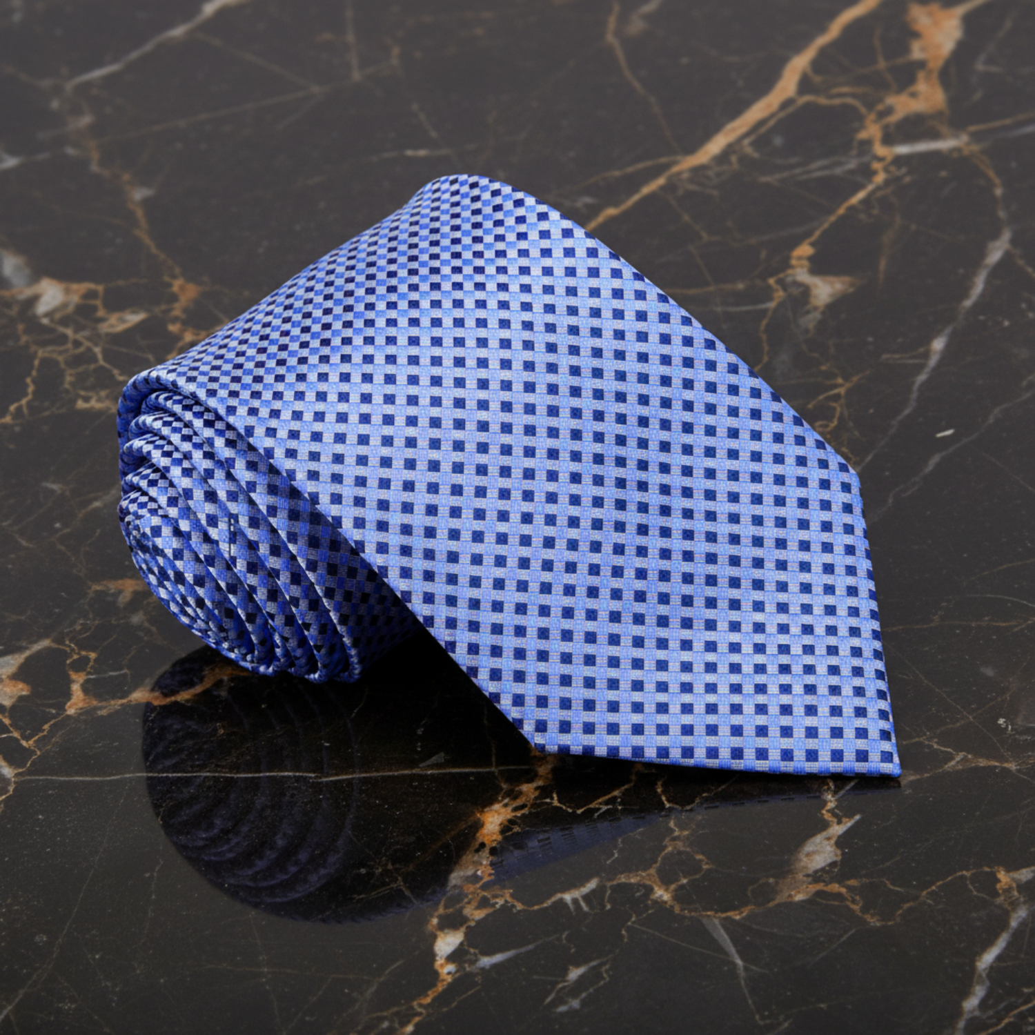 Blue checkered tie on a white background