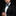 Blue and Green Half Circle Bow Tie and Accenting Square on Man
