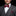 Man red patterned polka bow tie and red pocket square