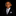 boy with black suit wearing silver and black pinstripe tie and square