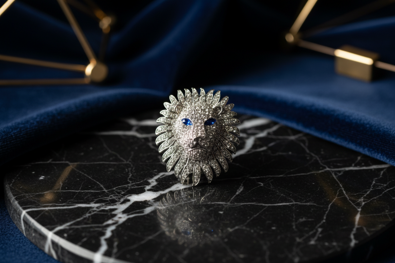 Decorative lion head with gemstones on a white background