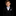 Young boy in a black suit with a gray bow tie and pocket square on a black background