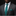 Man wearing a gray suit with a green tie and pocket square against a black background