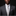 Man wearing a gray suit with a patterned tie and pocket square on a black background