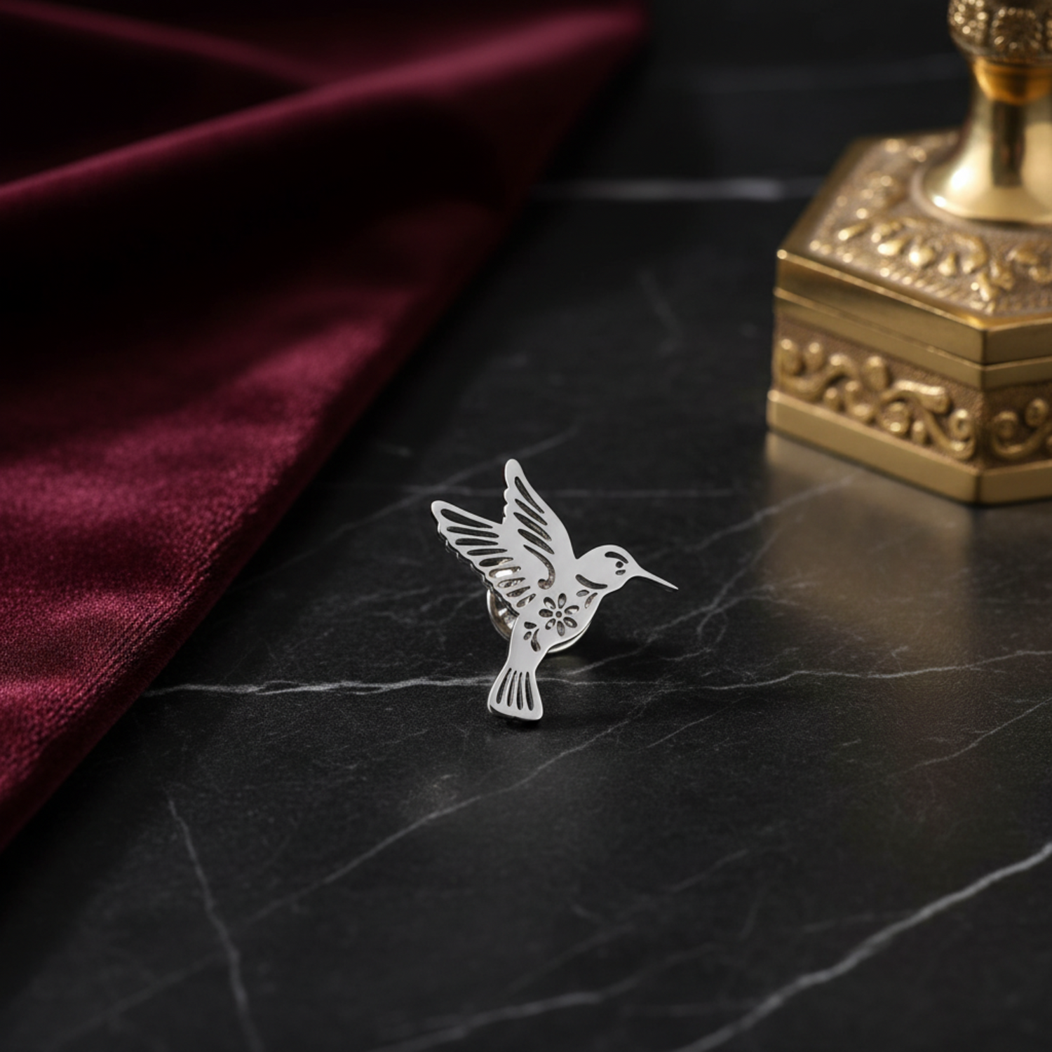 Small Silver Colored Hummingbird lapel pin