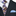 A Purple, Yellow, Light Blue Plaid and Paisley Pattern Necktie, With Accenting Pocket Square