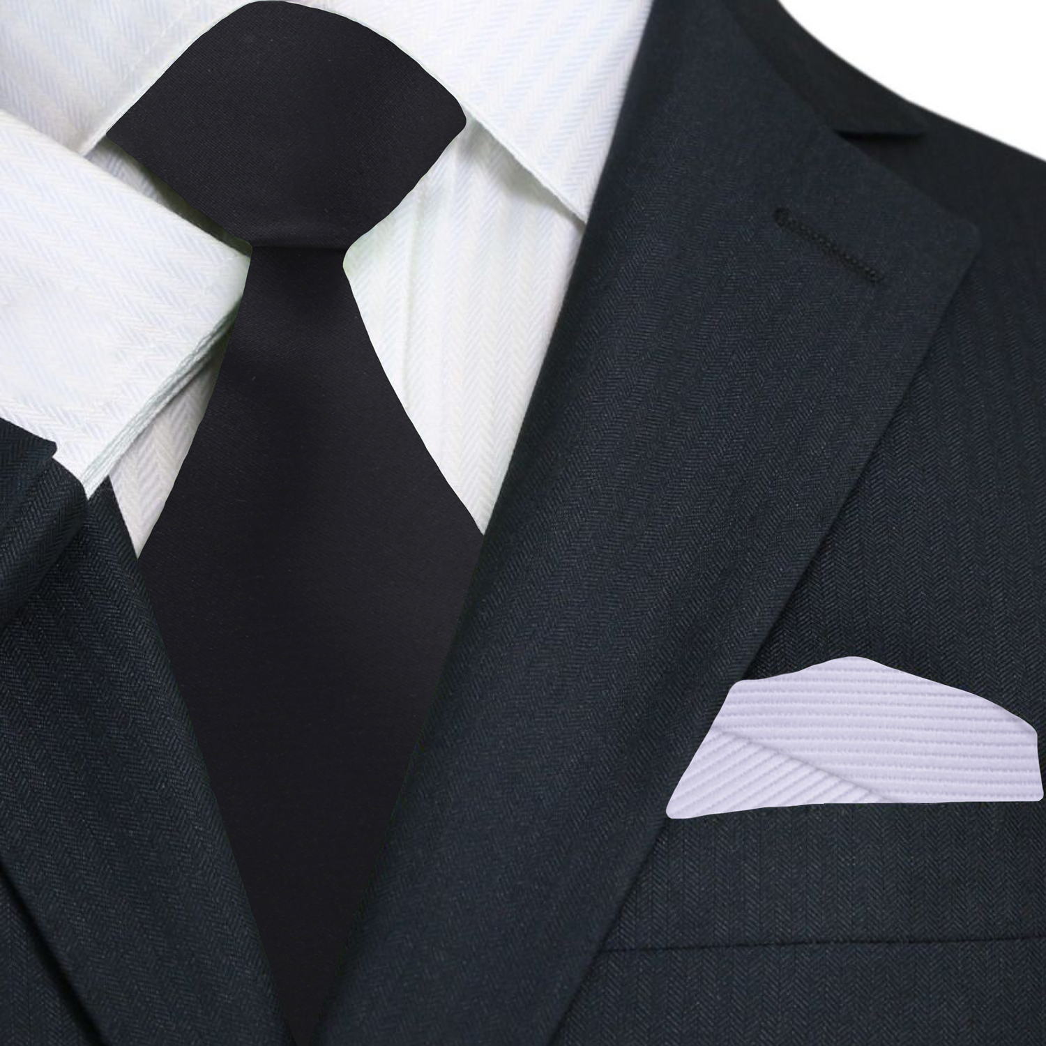 Black suit with white shirt, black tie, and white pocket square on a white background