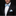 Man wearing black suit with light powder blue bow tie and square