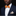 Solid orange bow tie and accenting square on man with suit