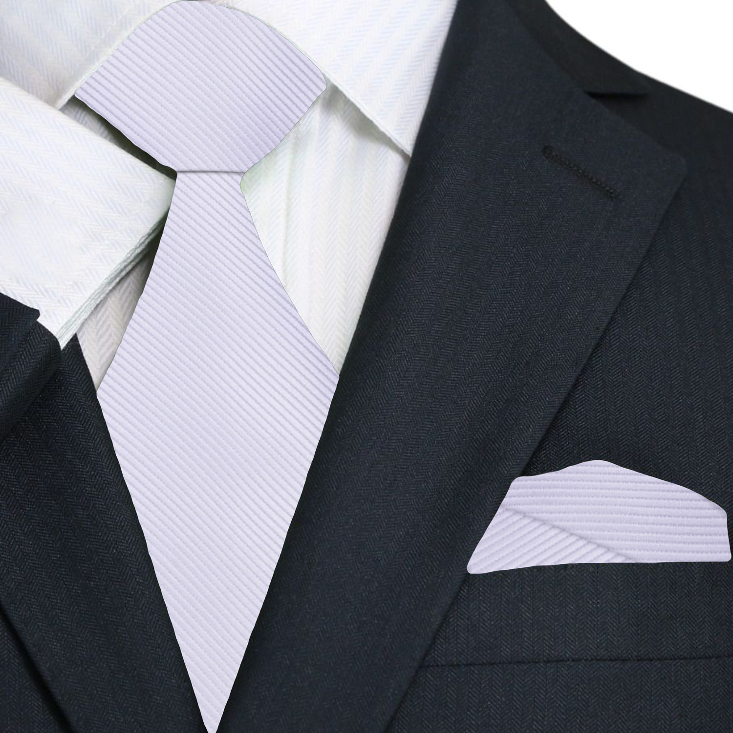 Black suit with white dress shirt, white tie, and matching pocket square on a white background
