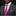 Man wearing a gray suit with a pink tie and matching pocket square on a black background