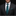 Man wearing a dark suit with a green tie against a black background