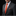 Man wearing a gray suit with an orange tie and pocket square on a black background