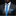 Man wearing a gray suit with a blue tie and pocket square on a black background