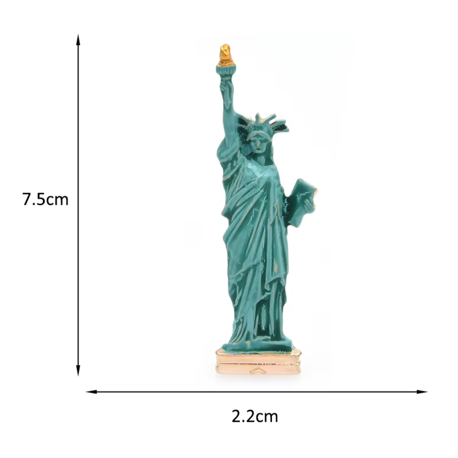 A small Statue of Liberty figurine in a teal-green finish with a gold torch and light wood base, shown on a white background with dimension arrows and labels reading 7.5 cm height and 2.