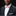 Man wearing a black suit with a white shirt and a colorful bow tie against a black background