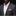 Man wearing a gray suit with a red pocket square against a black background