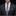 Man wearing a dark suit with a colorful geometric tie and matching pocket square.