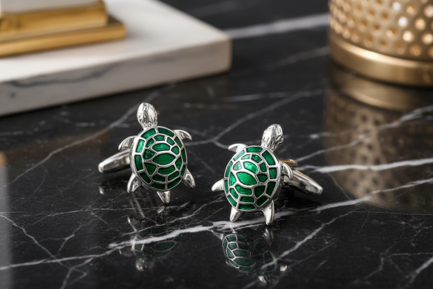View 2 A chrome and green color turtle design pair of cuff-links.