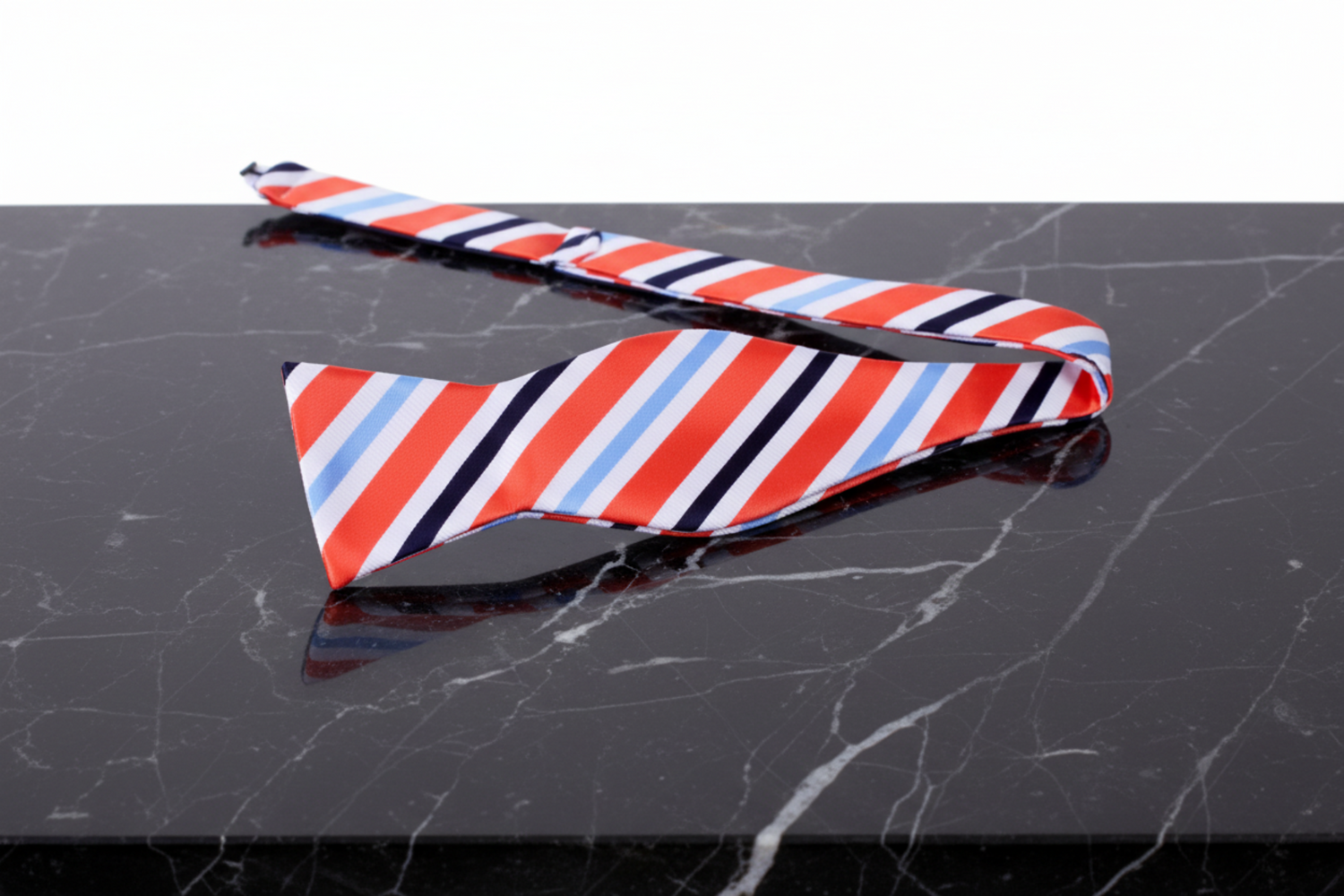orange white blue black stripe bow tie