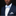 Man wearing a navy suit with a blue patterned bow tie and plaid pocket square against a black background