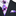 Black suit with a purple and white polka dot tie and pocket square.