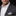 Man wearing a gray suit with a colorful pocket square on a black background