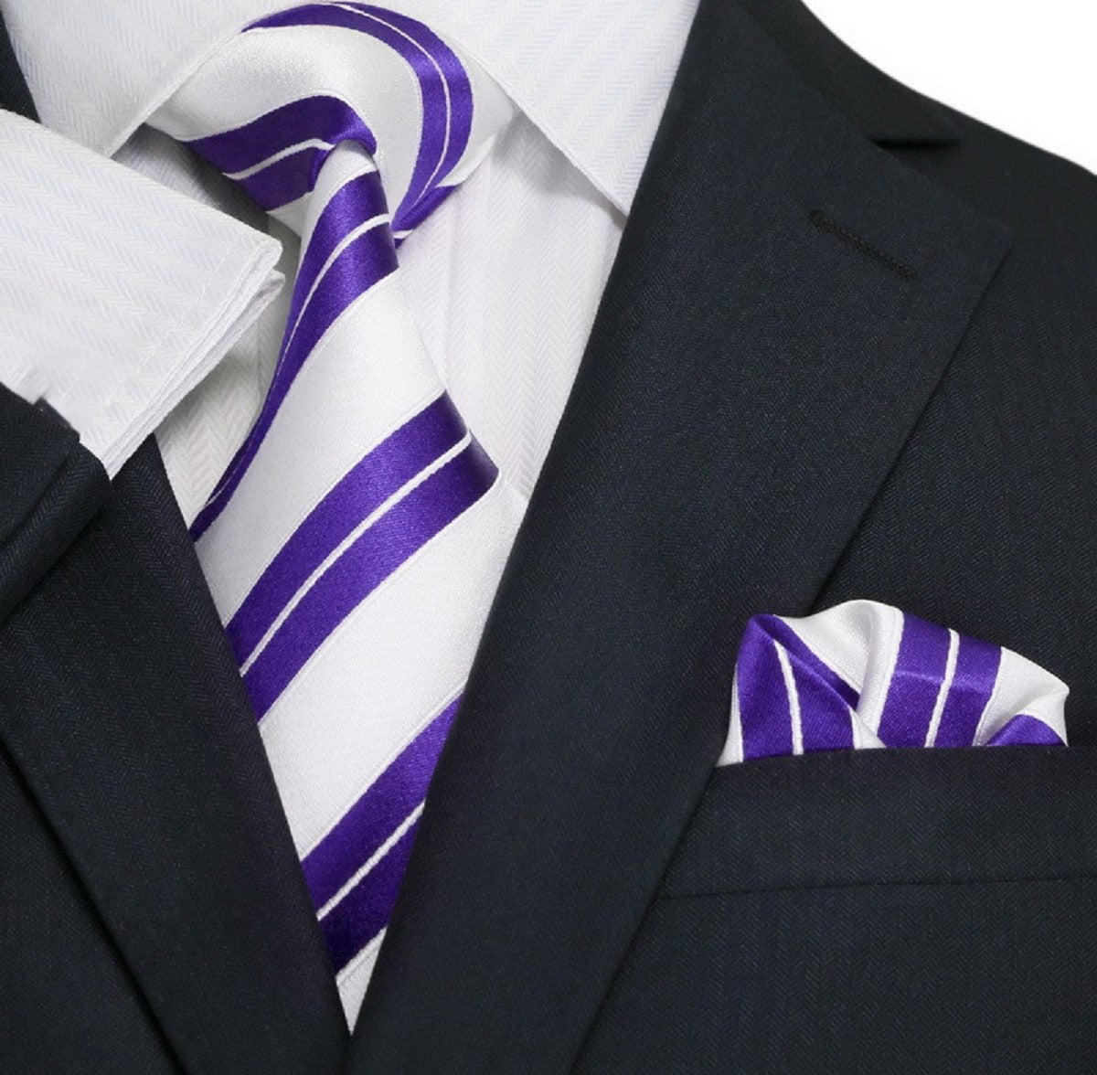 Black suit with a white shirt, purple and white striped tie, and matching pocket square.