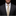 Man wearing a dark suit with a white shirt and yellow striped tie on a black background