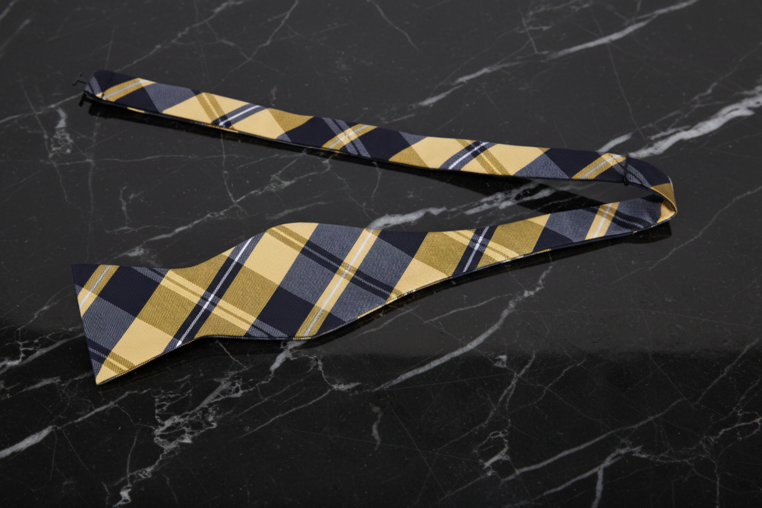 A Yellow, Black Plaid Pattern Self Tie Bow Tie