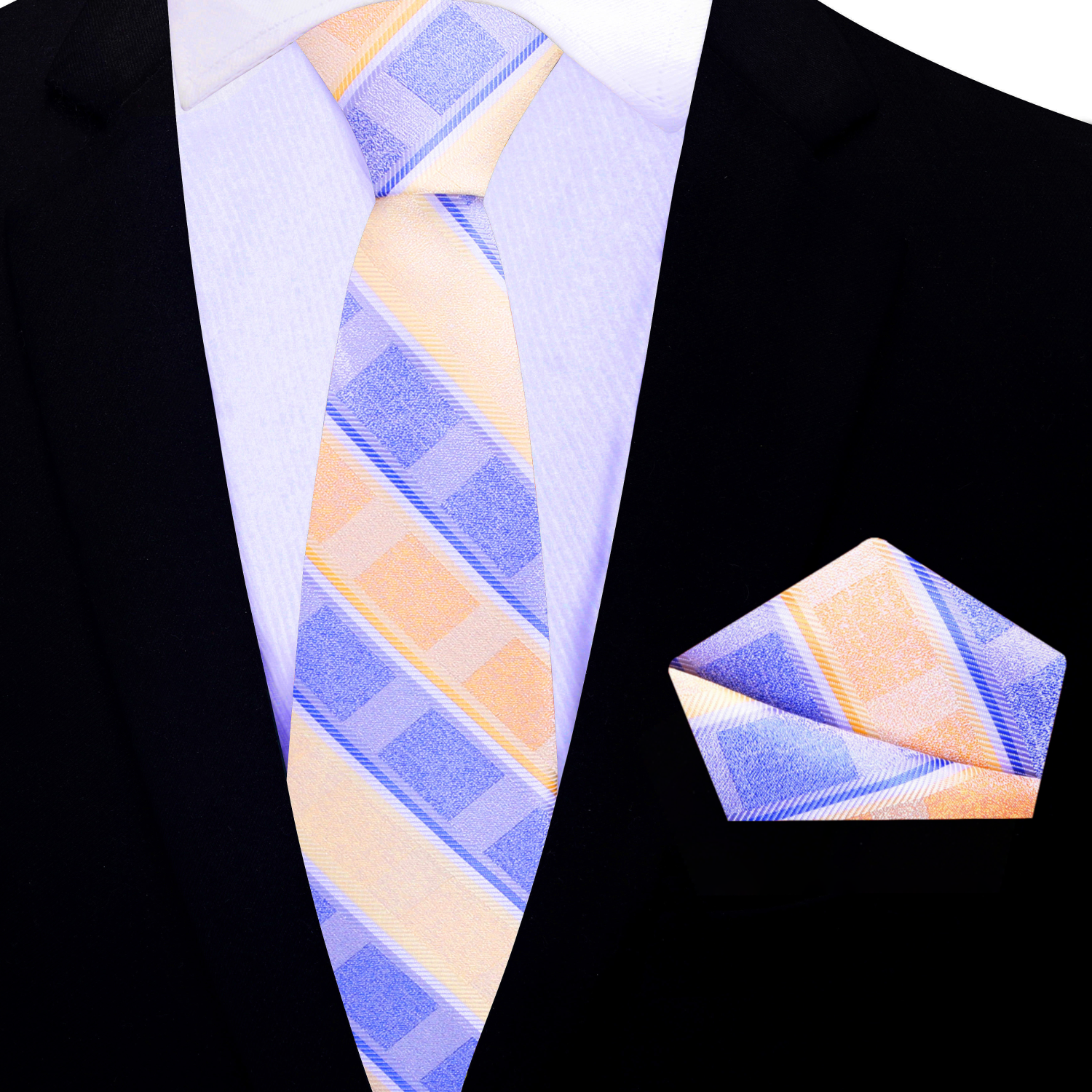 yellow thin tie and matching pocket square on a black suit jacket