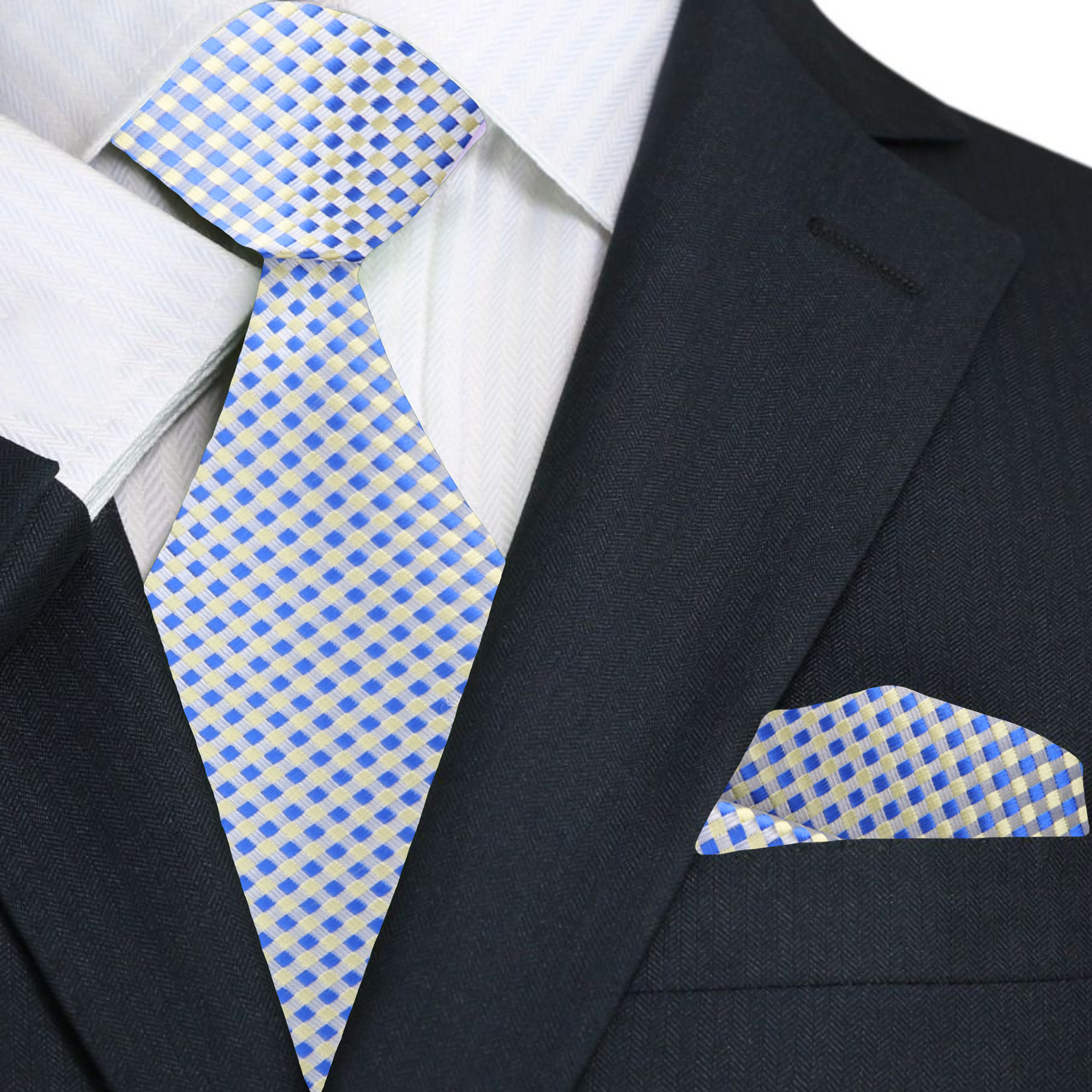 Blue and yellow checkered tie and pocket square on a black suit jacket.