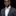 Man wearing yellow paisley bow tie and accenting square