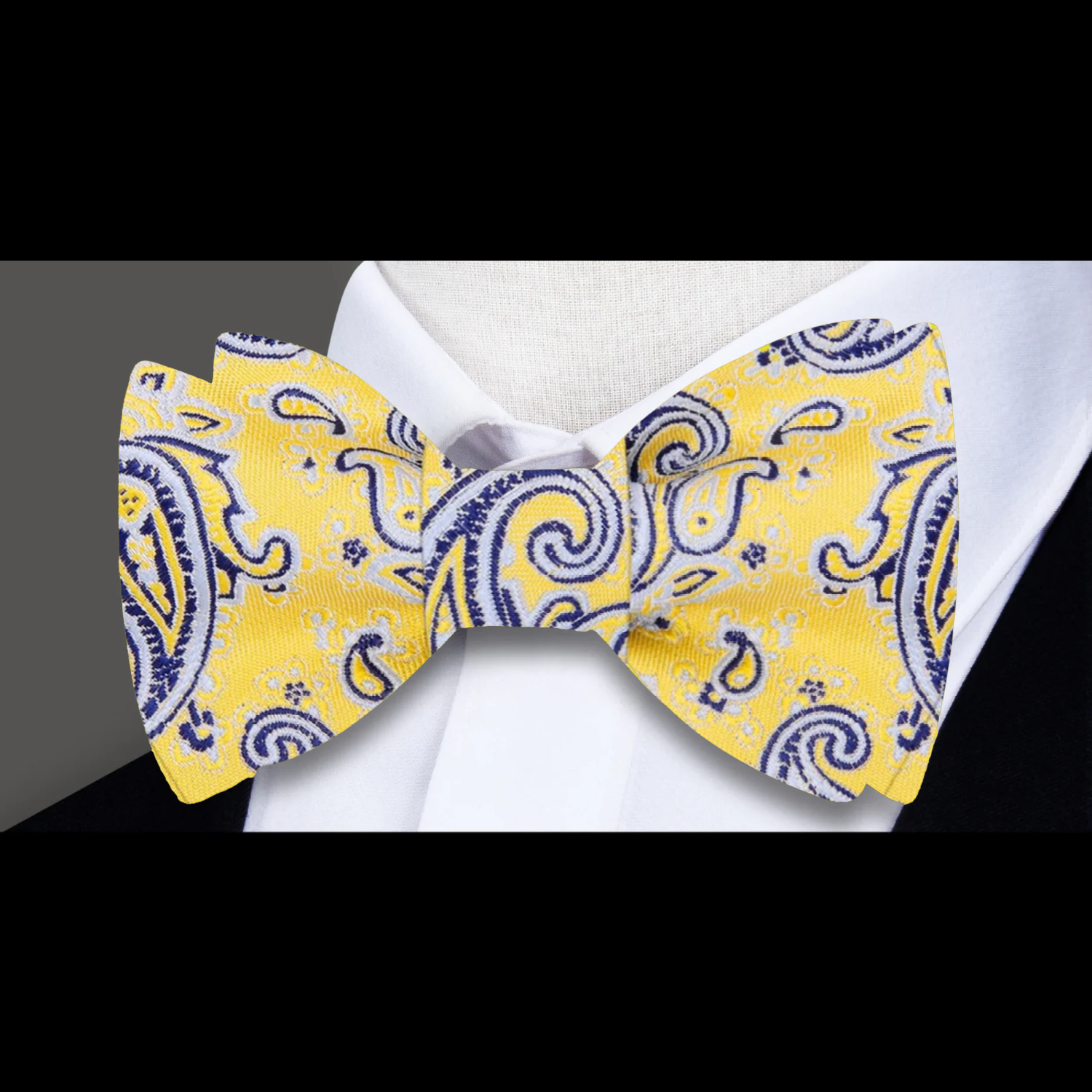 A Yellow, Light Blue, Black Paisley Pattern Bow Tie