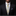 Man wearing a black suit with a yellow paisley tie and blue pocket square on a dark background
